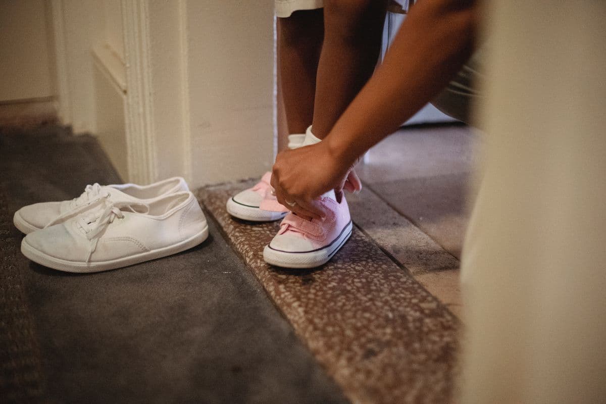 A pair of small pink sneakers